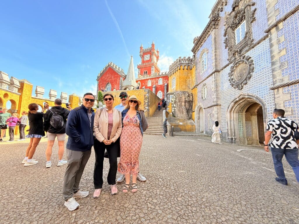 A cruise guest exploring Pena Palace in one of our tuk tuks โ just 45 minutes after leaving Lisbon port.