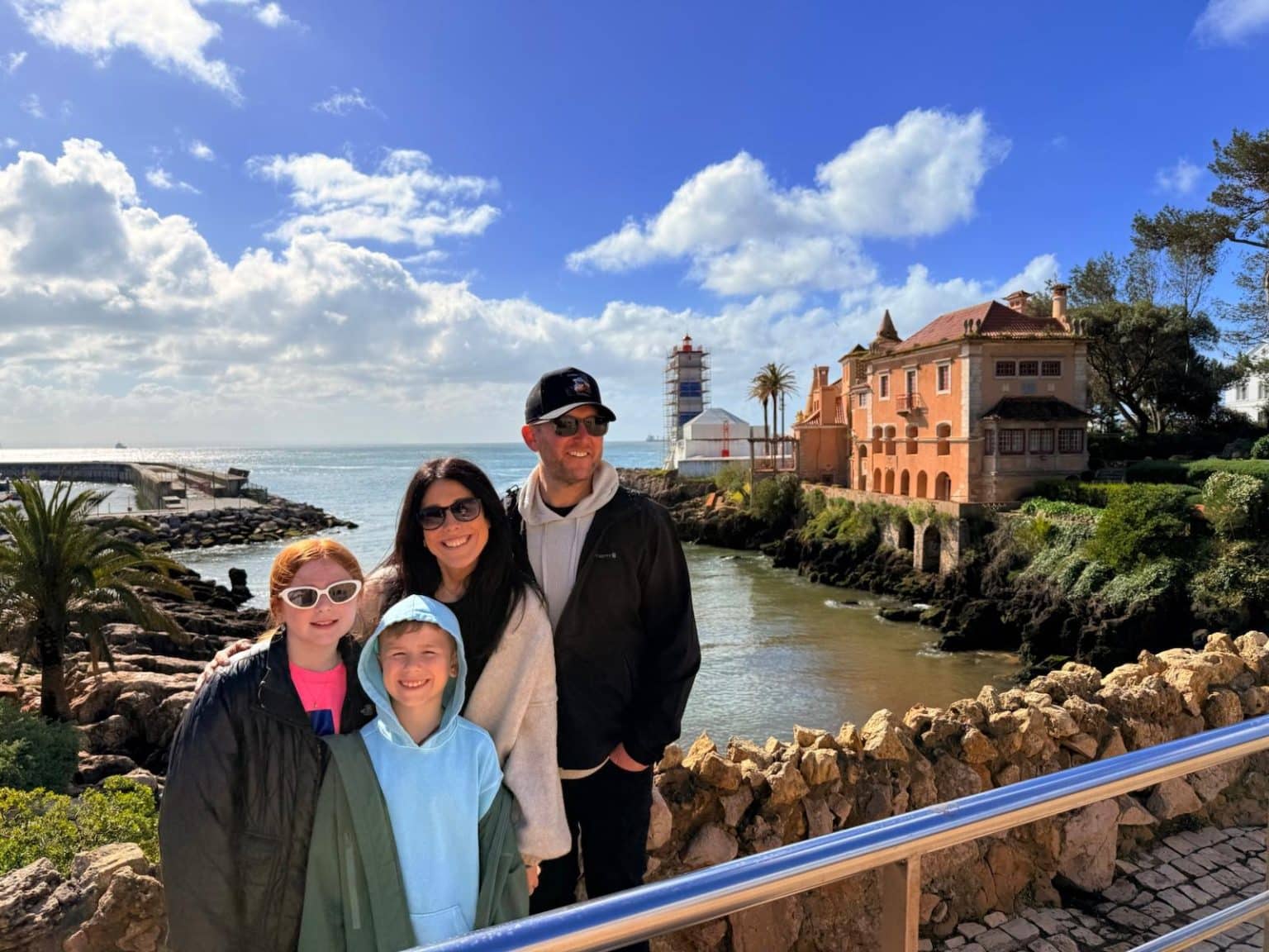 Four visitors beside the Santa Marta waterfront in Cascais