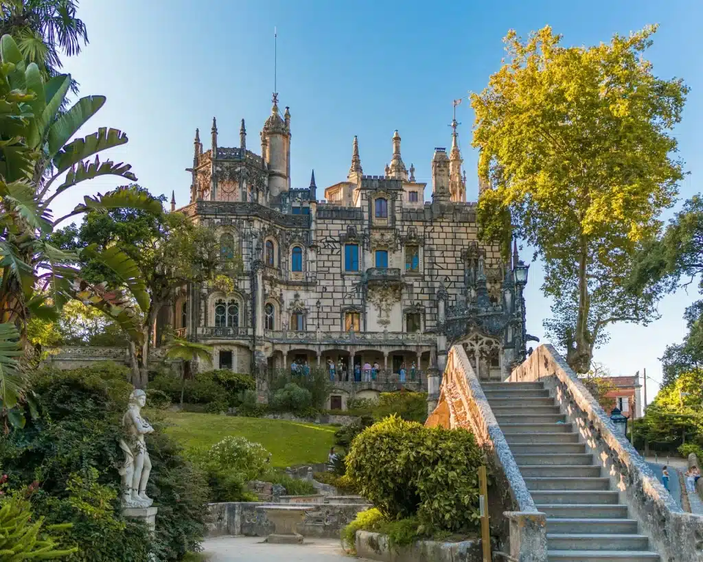 Stone stairway leading through the gardens beside Quinta da Regaleira palace in Sintra