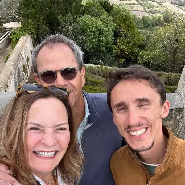 Smiling couple enjoying a memorable private tour in Sintra, Portugal, with their friendly Yes, You Deserve! guide.