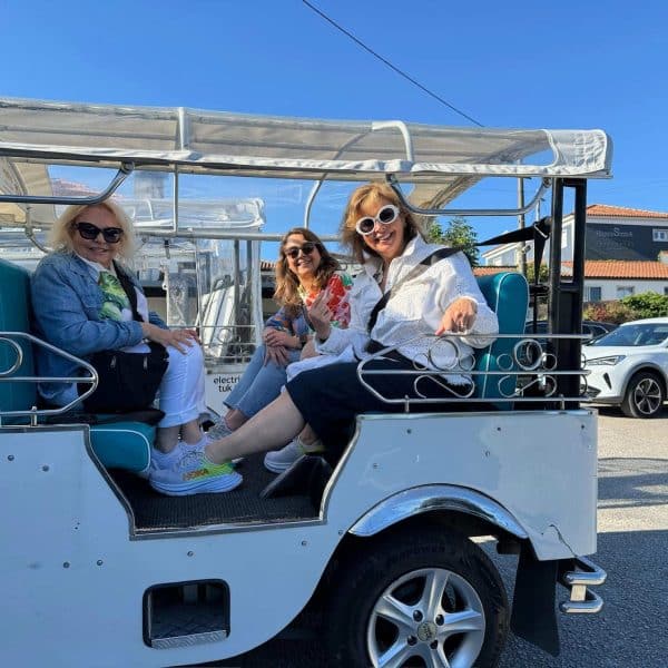 tourists doing a tuk tuk tour in sintra